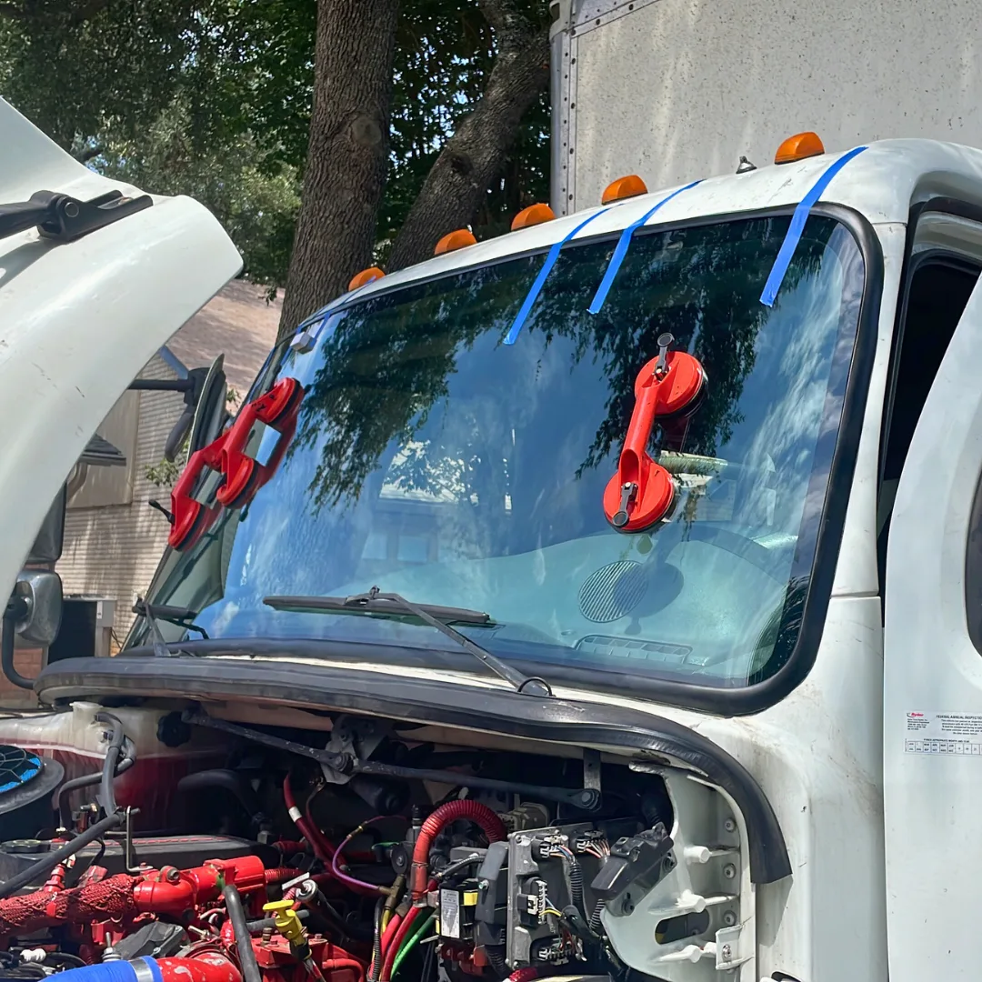 Mobile windshield replacement on a semi truck at the customer's location